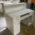 Import factory price modern white small reception desk for cellphone store from China