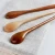 Import Food Grade Natural honey olive cooking kitchenware wooden spoon from China