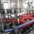 Import HDPE Bottle Rising Filling and Sealing Machine with Aluminum foil sealing from China