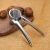 Import High quality quick manual kitchen tool funnel walnut clip manual nutcracker nut tongs with spring from China