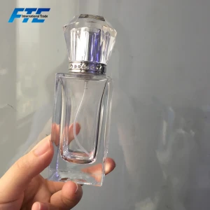 Hot Sale 50ml silver gold cap rectangular empty cosmetic glass pump bottle luxury perfume bottle