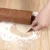 Import kitchen utensil baking tool silicone rolling pin with wood hand and Non-stick Surface from China