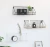 Import Newish hot selling Creative wall rack bedroom Nordic ins style iron storage basket for home decoration from China