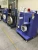 Paper tape slitting and winding machine with easy operation