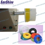 Plastic wire coil winding machine