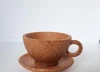 Set of coconut wooden tea cups and saucers from Vietnam