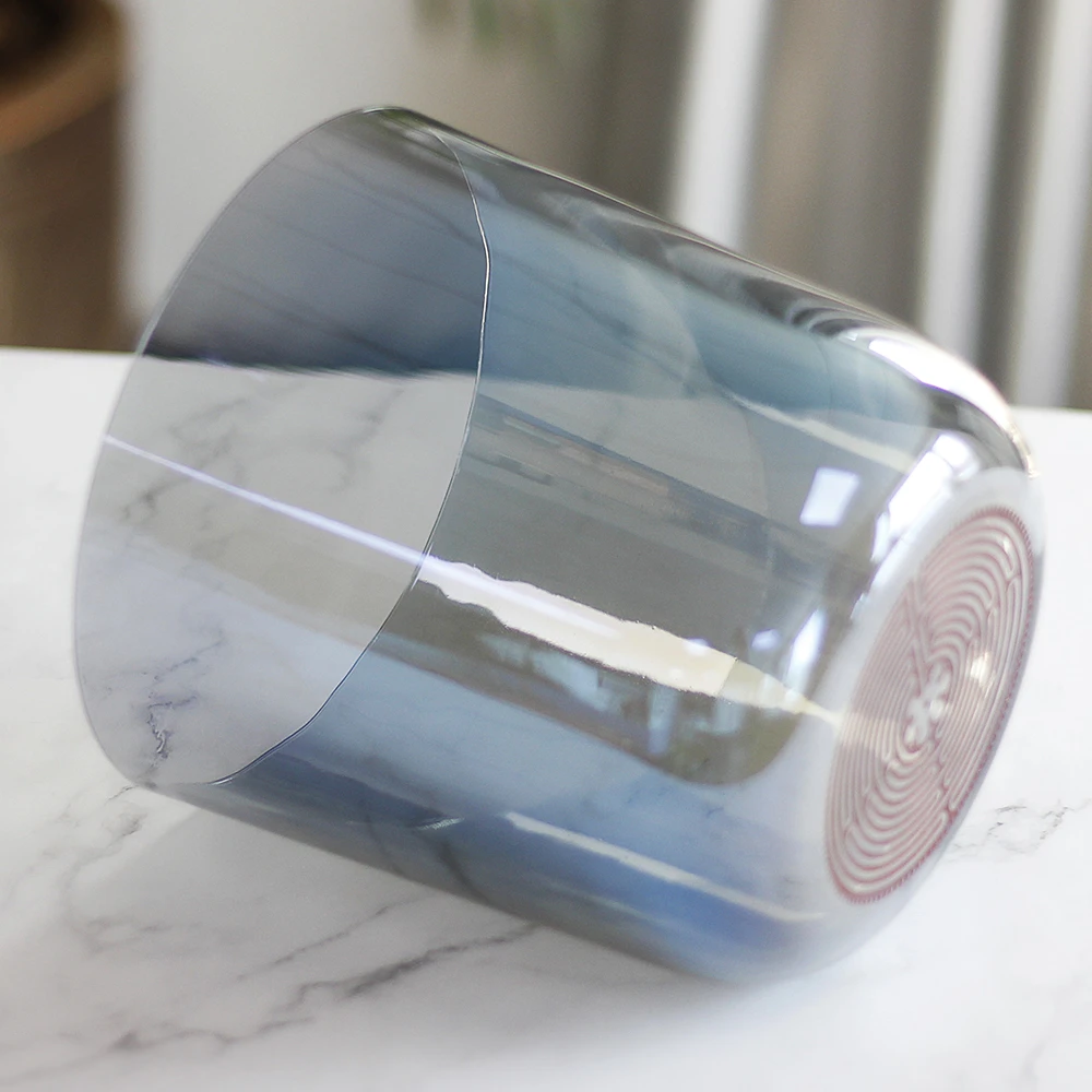 Shallow transparent blue crystal singing bowl without design