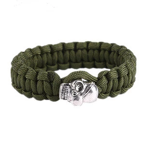 Wholesale Azo free & Nickel free survival 100% hand braided men paracord skull bracelet for decoration and outdoor sports