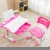 Import Wood desktop and metal frame height adjustable kids sudy table and chair set from China