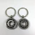 Import Bearing rotation round metal key chain/ fancy wheeling engraving key holder / fashion rotating key ring from China