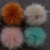 Import Cheaper faux fur raccoon fur pom poms with snap for hat from China