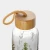 Import Factory Classic Borosilicate Glass Water Bottle glass tea water bottle with bamboo lid travel borosilicate glass water bottle from China