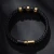 Import Fashion Black Gold Leather Woven Bracelet High-end Magnetic Buckle Boutique Stainless Steel Bracelet from China