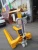 Import Hand Operated Paper Roll Pallet Truck Paper Cart Hand Pallet Trolley Forklift Manual Hydraulic Pallet Truck from China