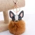 Import MIA Cute Rabbit Fur Ball PU Dog Keychain Pompom Key Chain Pom Pom Porte Clef Fluffy Leather Key Ring from China