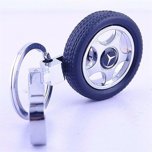 New Design Products Creative Rotating Tire Keychain Car Business Pendant Gift