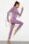 Import New style slim-fit yoga sportswear fitness two-piece zipper leisure sports women&#x27;s tracksuits complete set from China