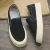 Import OEM Non-Slip Style Plain White and Black Canvas Sneakers Walking Style Shoes for Men and Women Lightweight Loafers Shoes from China