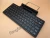 Import RFY Dual Channel Multi-Device Universal Wireless Bt Rechargeable Keyboard with Sturdy Stand for Tablet Smartphone PC Windows from China