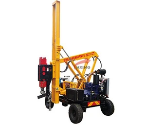 Road barrier hydraulic pile driver with driver-extractor vibratory hammer