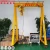 Import Small mini 500kg 1 2 3 5 ton mobile portable gantry crane price with electric chain hoist from China