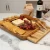 Import wholesale charcuterie knives platter boards bamboo platters cheese cutting board set with knife and stainless steel tools from China