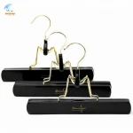 wooden hair hanger with logo